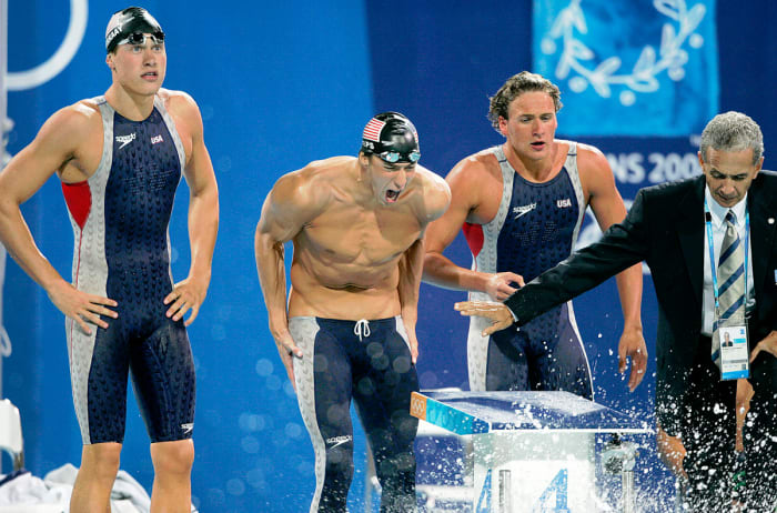 HEAVY MEDALS
The 4x200 gang—Vanderkaay, Phelps and Lochte (above)—cheered Keller all the way to gold in Athens.